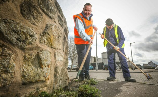 Fife Council project officer Craig Hutton, left, with a member of the local Community Payback team.