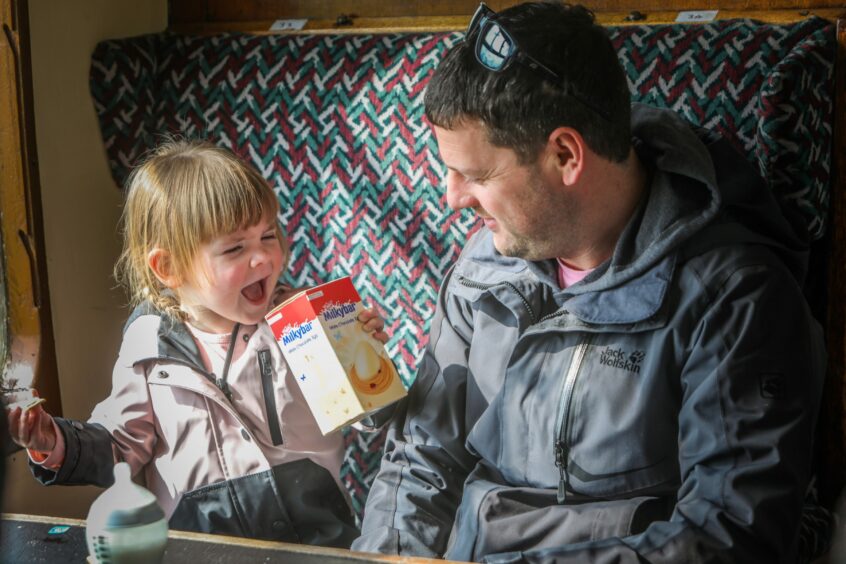 Two-year-old Brooke Geddes and dad David on the Easter Eggspress. Pic: Mhairi Edwards/DCT Media.