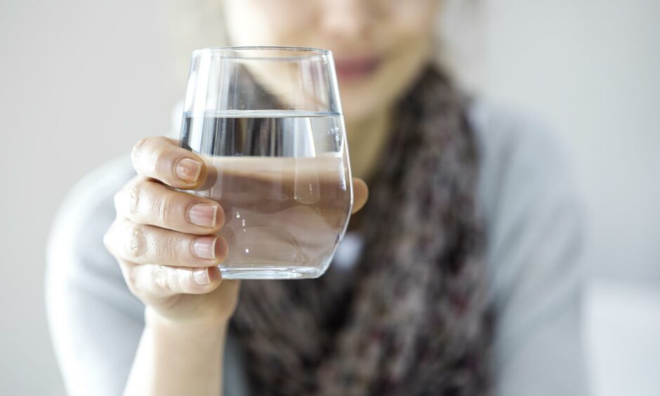 Replacing coffee with water and help when trying to reduce caffeine intake.