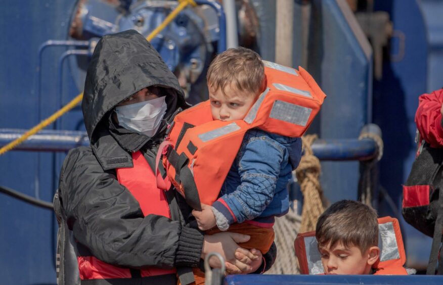 Migrants arrive after crossing the English Channel to Dover in small boats last week