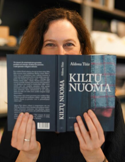 Aldona Turr's Dundee kilt shop book is a hit in her homeland.
