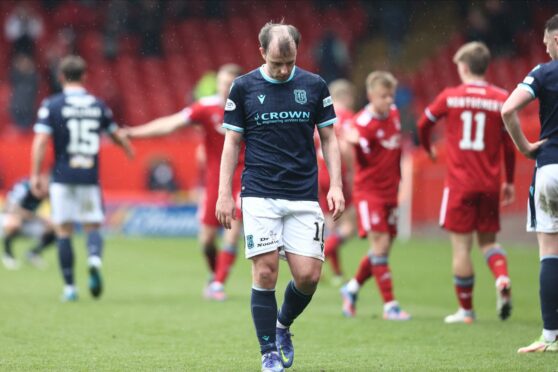 Paul McGowan trudges off at Pittodrie.