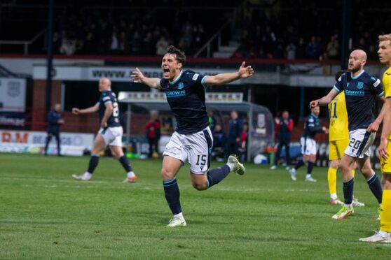 Josh Mulligan celebrates his goal against Hibs.