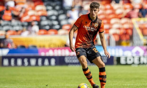 Lewis Neilson in action for United