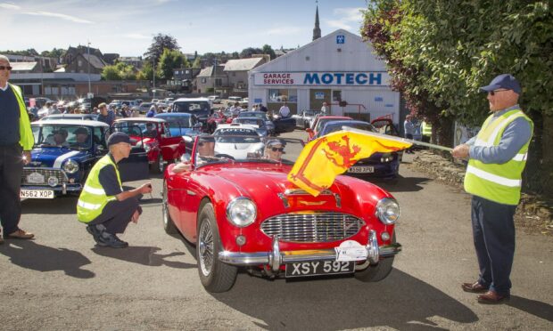 Vehicles are waved off from the start line of a previous Strathmore Classic Car Tour. Pic Paul Reid.