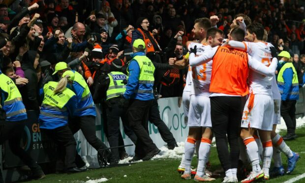 Repeat of celebrations? United fans in Dingwall in November