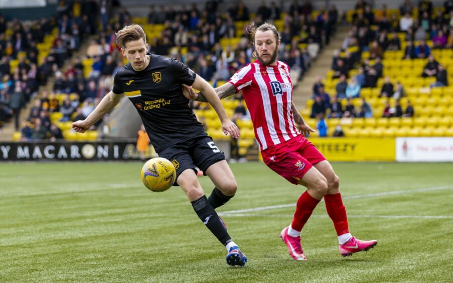 Stevie May in action against Livingston.