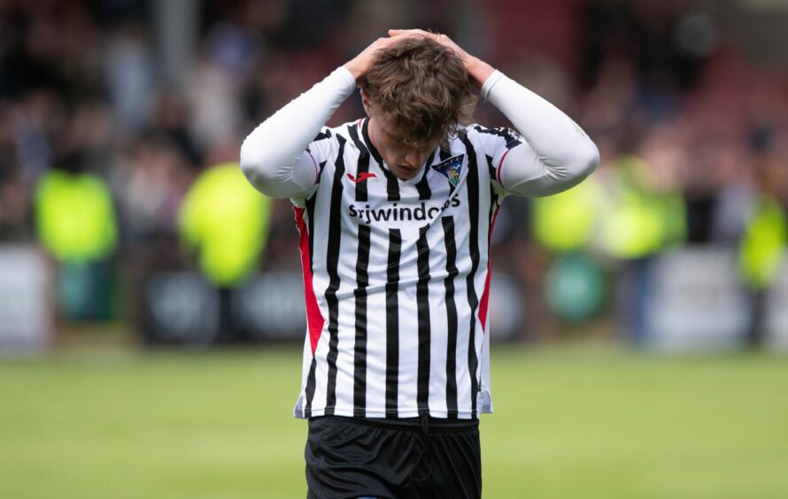 Dunfermline's Lewis McCann can't hide his disappointment at full time