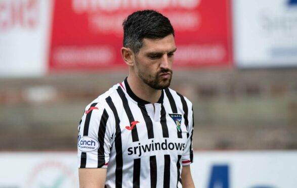 A dejected graham Dorrans after Dunfermline's relegation was confirmed.