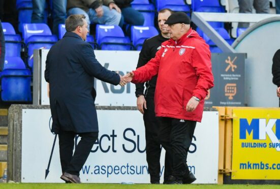 Dick Campbell and Billy Dodds shake hands during the Premiership play-off semi-final.
