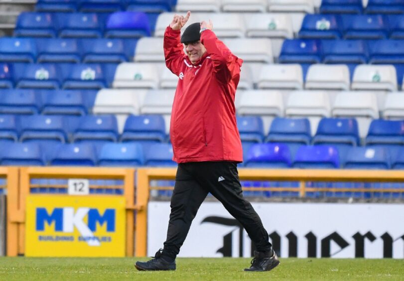 Dick Campbell acknowledges the travelling Arbroath support at full-time in Inverness.