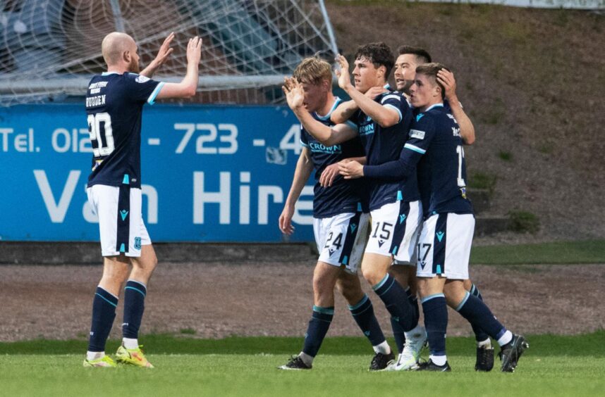 Josh Mulligan celebrates his first league goal for Dundee.