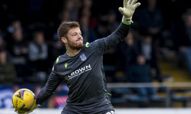 Harry Sharp in action for Dundee.