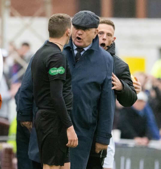 Arbroath manager Dick Campbell has words with the linesman in the first half