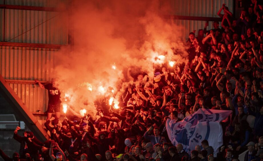 Saints ultras used pyrotechnics to add colour to the atmosphere.