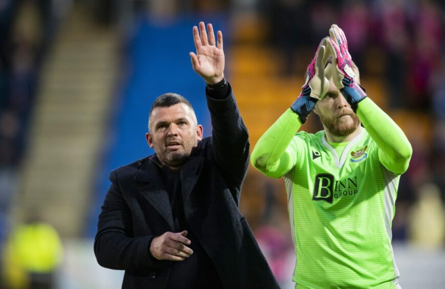 Callum Davidson and Zander Clark show their appreciation to supporters.