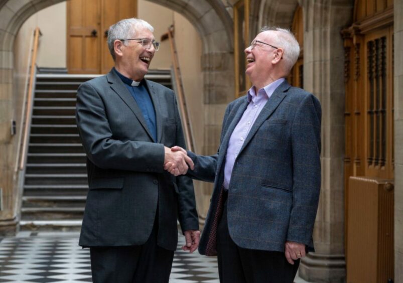 New Moderator of the Church of Scotland Rev Dr Iain Greenshields, left, is welcomed by his predecessor, Jim Wallace.