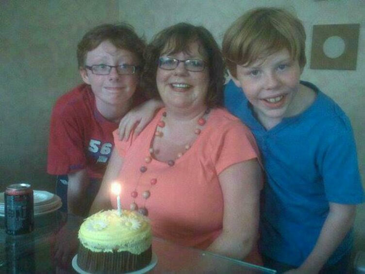 Andrew and his brother with their beloved Auntie Lorraine.