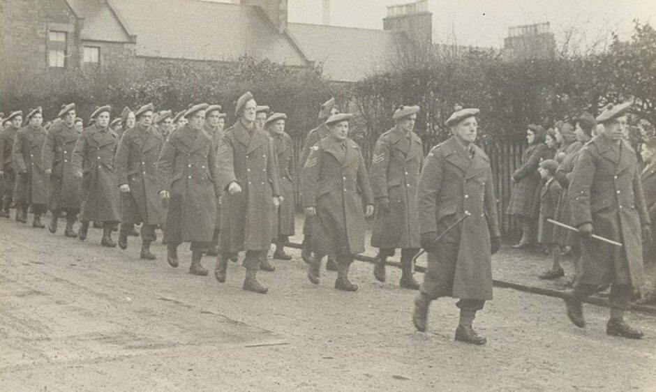 Percy Caroline, far right with a cane, with the Wellbank Home Guard.