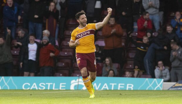 Ricki Lamie celebrates scoring the goal which fired Motherwell in to Europe.