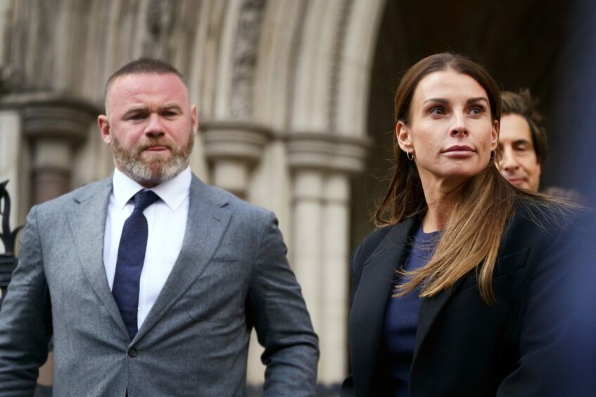 Wayne and Coleen Rooney at the Royal Courts Of Justice, London. Photo: PA.