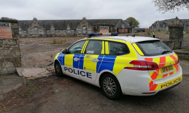 Police parked outside the former Auchterderran Education Centre.