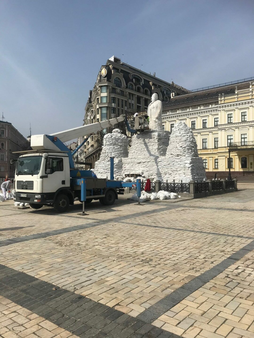 Protecting a statue with sandbags. Picture: Mark Cashley.