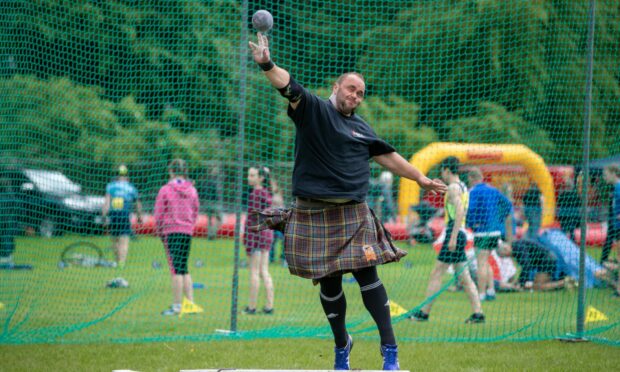 The heavies take to the field and the 16lb ball during the Cupar Highland games at Duffus Park in 2019