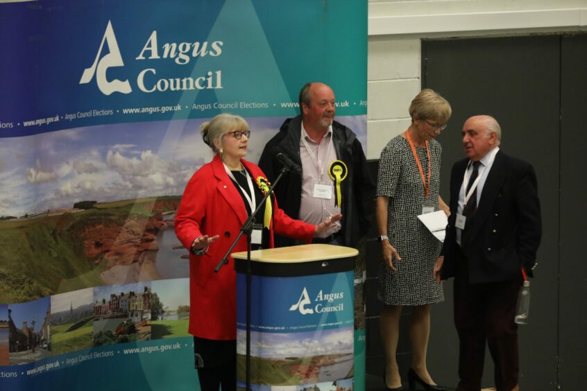 George Meechan (centre) with councillors Julie Bell and Ronnie Proctor at the Kirriemuir and Dean count at the local election count last year.