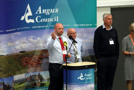 Carnoustie councillors, from left, Mark McDonald, Daviud Cheape and Brian Boyd at last week's election count. Pic: Gareth Jennings/DCT Media.