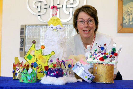 Angus Lord Lieutenant Pat Sawers with crowns crafted by local children for the main Angus jubilee celebration. Pic: Gareth Jennings/DCT Media.