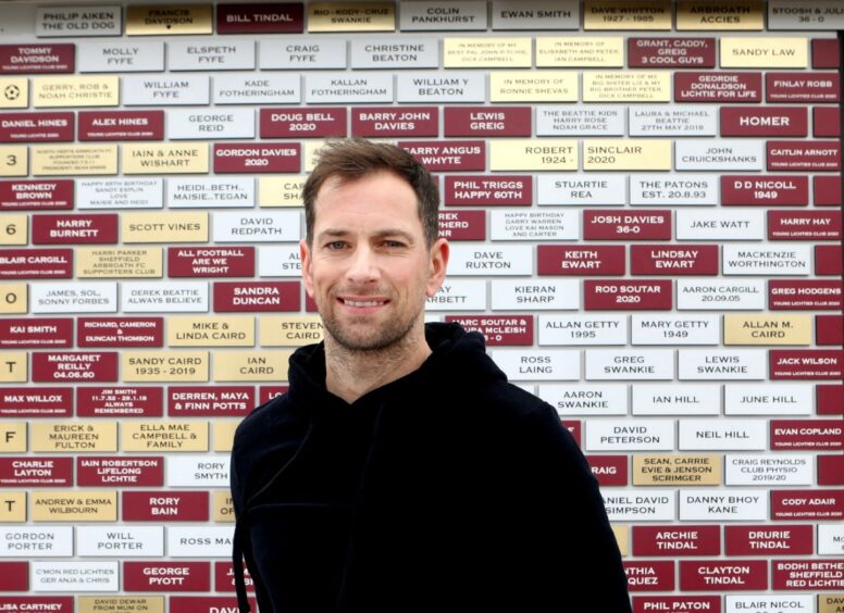 Gavin Swankie pictured recently beside the supporters' wall at Gayfield.