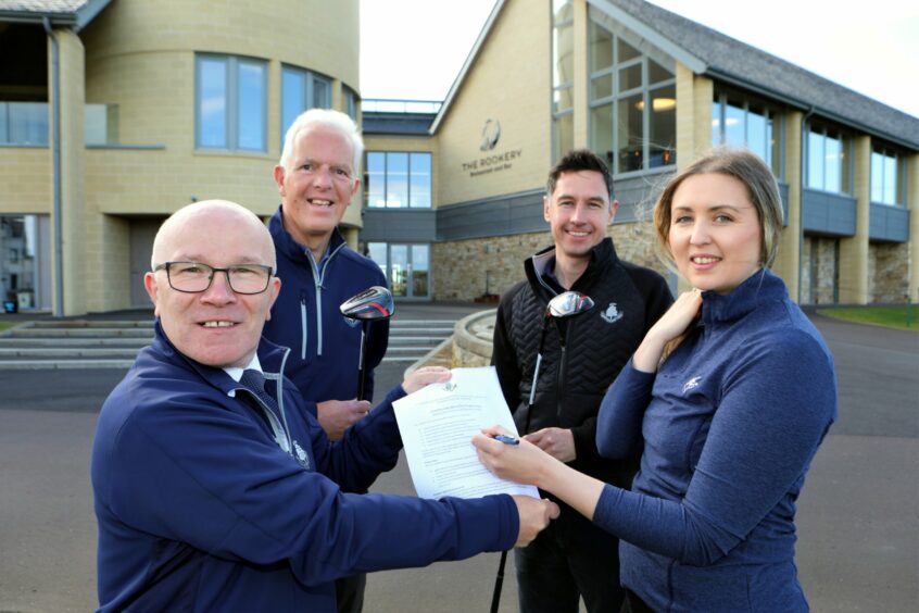 David Cheape, Donald Archibald, Michael Wells and Kim Speirs with the signing on forms at Links House. 