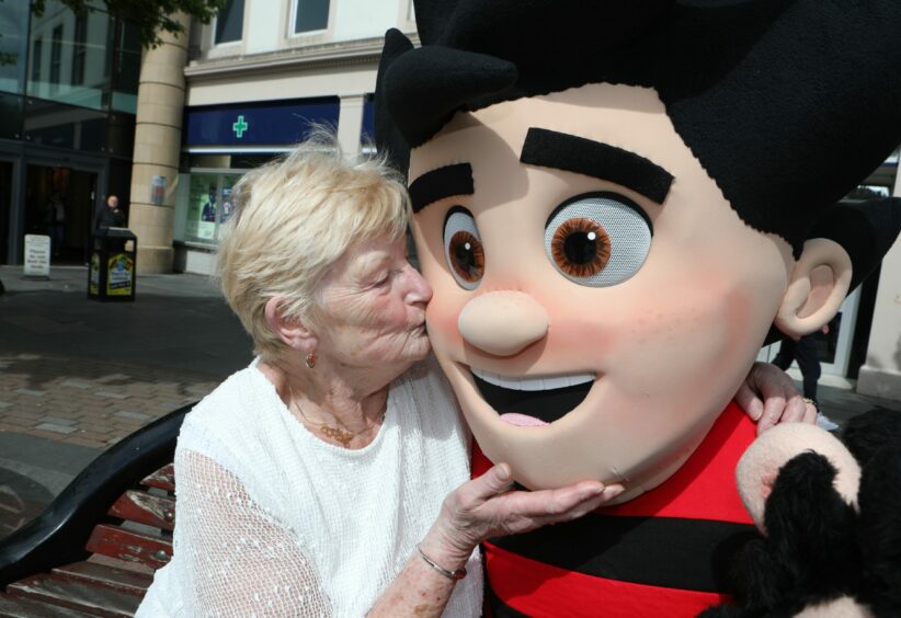 Kathleen O'Donnell, 80, with a blushing Dennis.