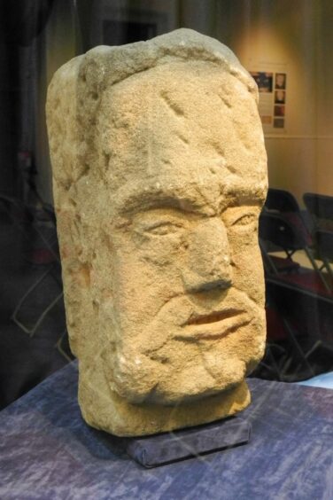 One of the Adam Christie stone heads on display at Montrose museum.