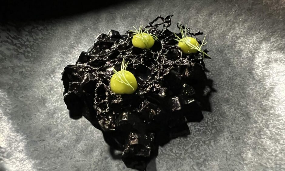 The squid in its own ink dish.