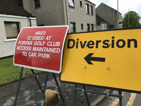 Diversion signs on Forfar's Arbroath Road put drivers on a lengthy diversion. Pic: Graham Brown/DCT Media.