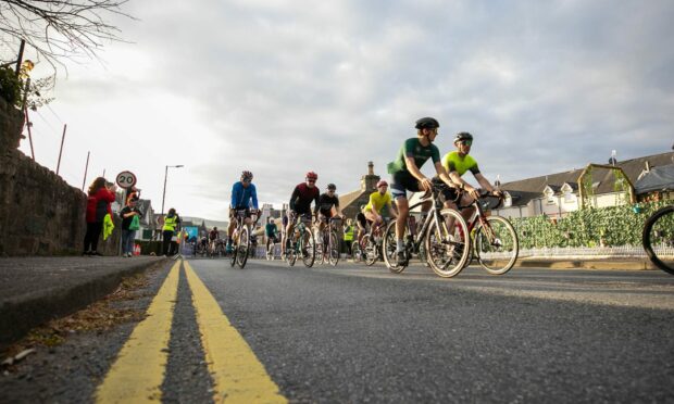 Cyclists going through Pitlochry during an Etape Caledonia event in 2022. Image: Kim Cessford/DC Thomson.