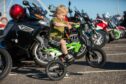 Young biker Aston Harris, 4, had some fun at Arbroath Harbour. Pic: Kim Cessford/DCT Media.
