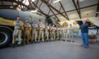 The Joint Aircraft Recovery and Transportation Squadron team that will rebuild the aircraft with (right) Air Station Heritage Centre chairman Stuart Archibald. Pic: Kim Cessford/DCT Media.