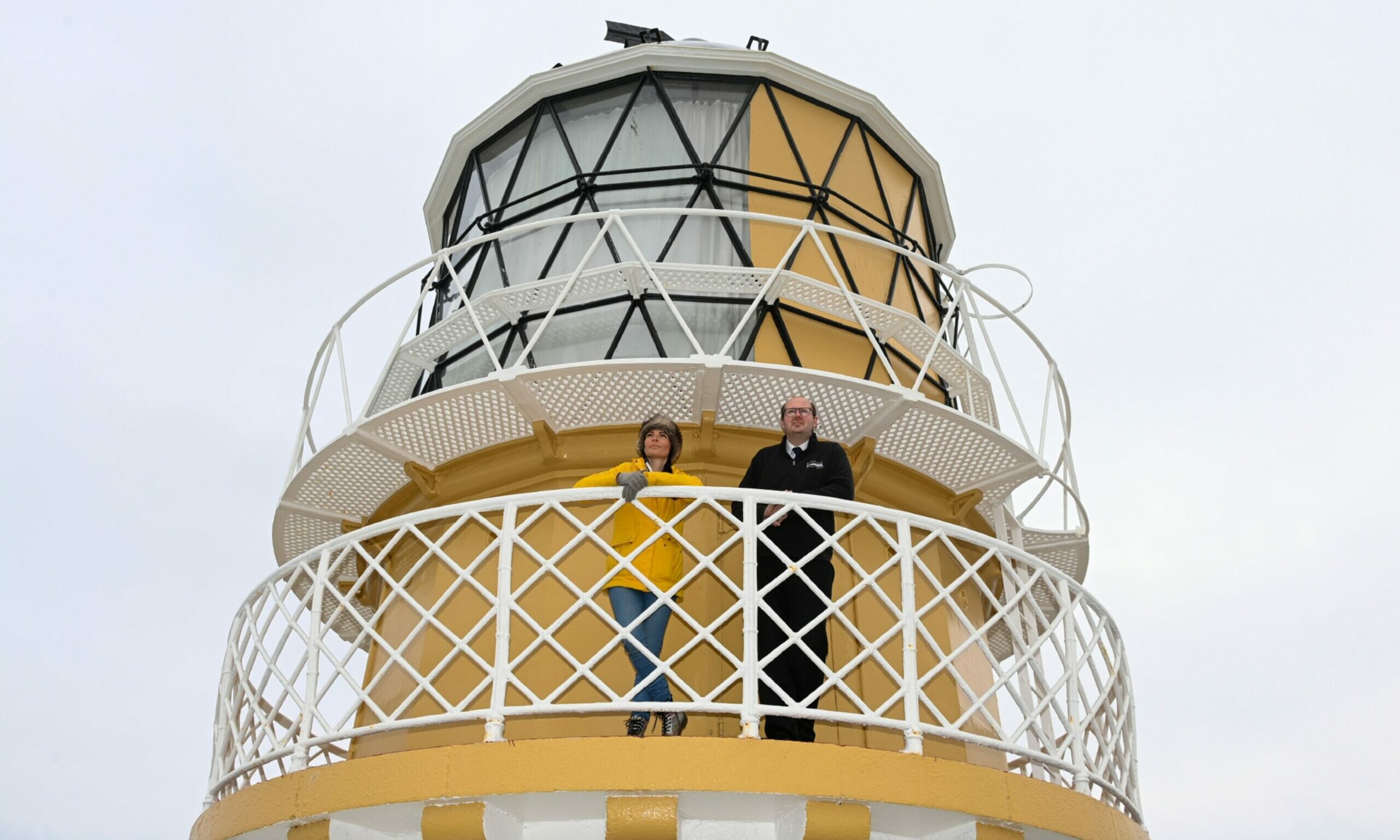 Gayle Ritchie and Museum of Scottish Lighthouses collections manager Michael Strachan on Kinnaird Head lighthouse. Picture: Kenny Elrick.