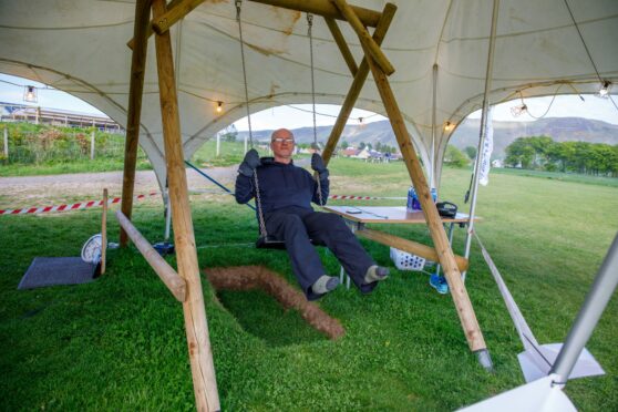 Richard Scott has broken the Guinness World Record for longest marathon on a swing