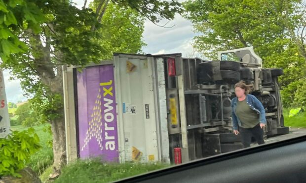 A lorry landed on its side following a crash on a Fife road. Photo: Fife Jammer Locations