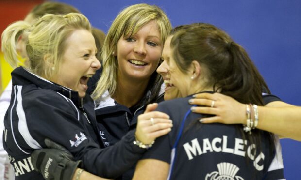 Eve Muirhead celebrates winning the last of her World Junior curling golds.