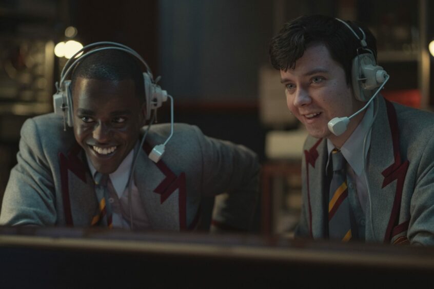 Ncuti Gatwa as Eric Effiong, Asa Butterfield as Otis Milburn in Netflix's Sex Education.