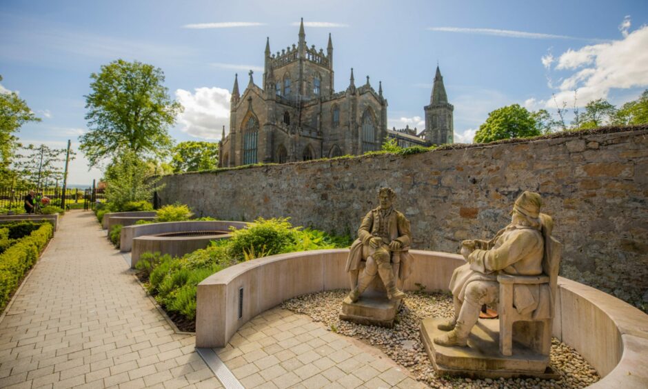 Carnegie Library and Galleries grounds with a beautiful view of the Abbey