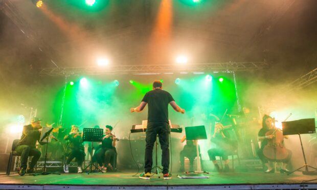 Courier News - Bryan Copland story - CR0035536 - Ibiza Orchestra Live events at Slessor Gardens in Dundee -  Picture shows scenes from the event during the Ibiza Orchestra performance --  Slessor Gardens, Dundee - Saturday 21st May 2022 --        Pic credit Steve MacDougall / DCT Media