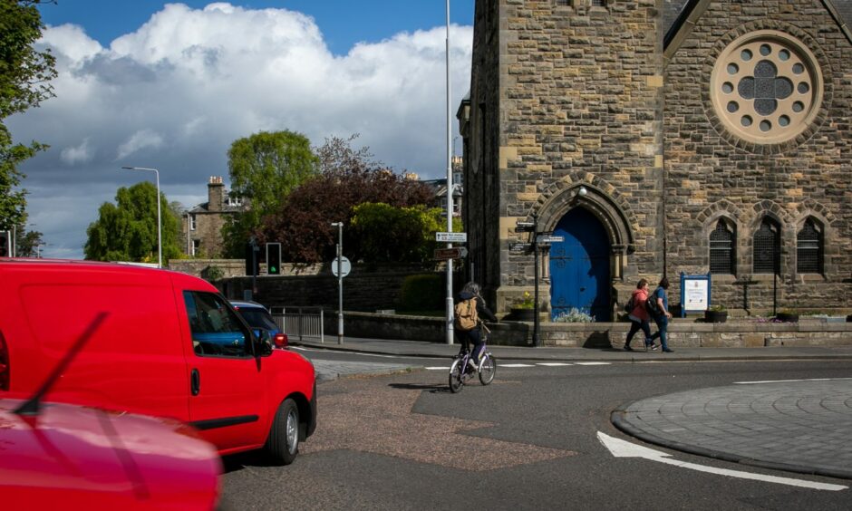 Cyclists have to contend with busy traffic when getting around St Andrews.