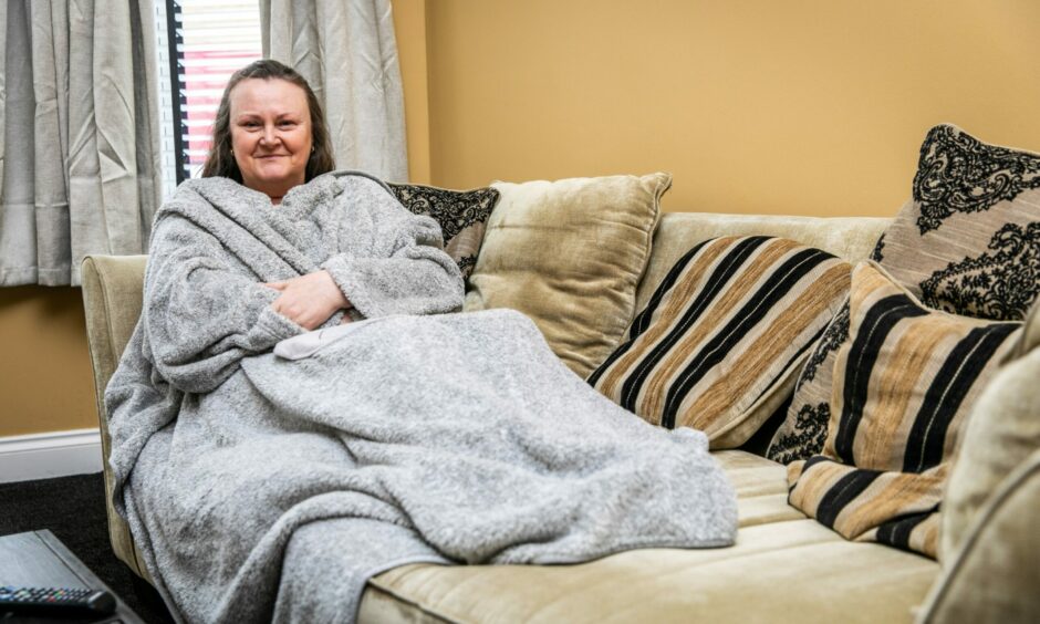 Karen Madej all wrapped up in her home.