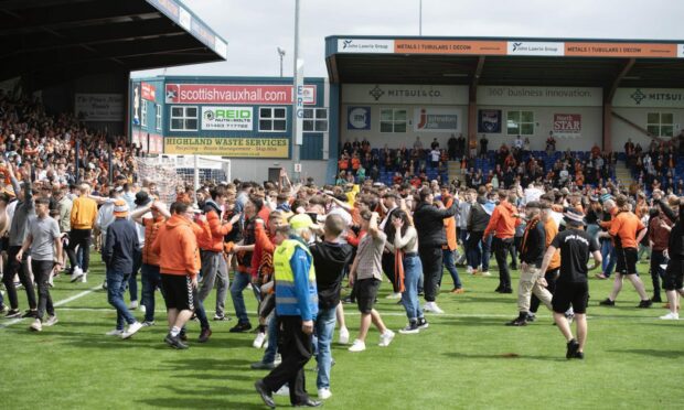 Fans are urged to leave the pitch